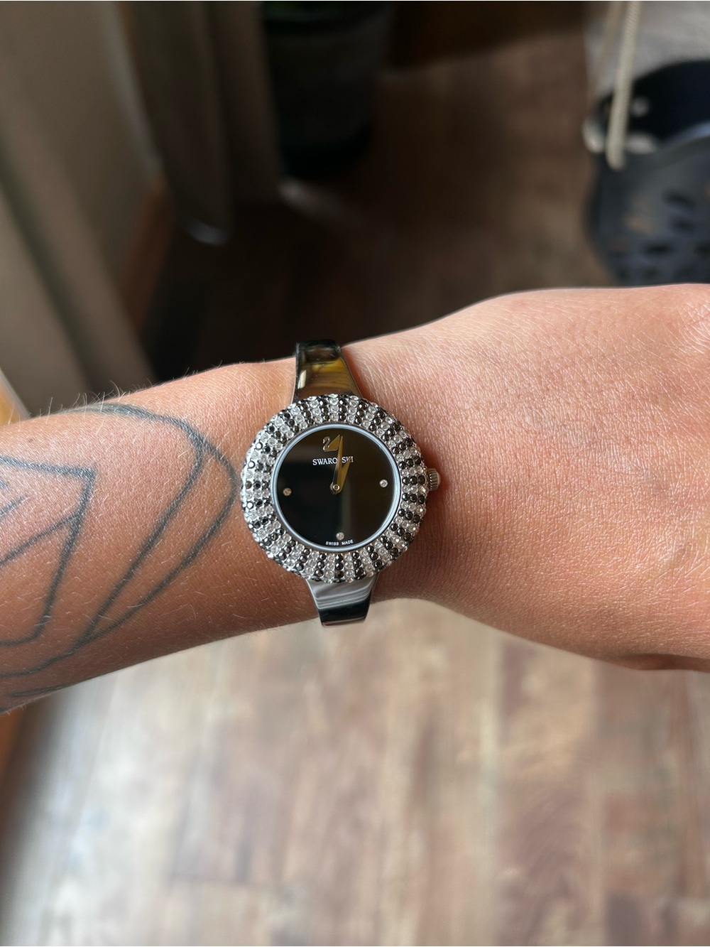 Swarovski Silver Bangle Watch with Black Dial and Crystal Halo